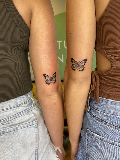 Matching Monarch Butterfly Tattoo, Best Friend Tattoos Back Of Arm, Butterfly Tattoo Down Back, Friend Tattoos Butterfly, Bff Tattoos Matching Butterfly, Butterfly Tattoo Behind Arm Above Elbow, Above Elbow Butterfly Tattoo, Small Matching Tattoos Mom And Daughter Butterfly, Best Friend Spine Tattoos