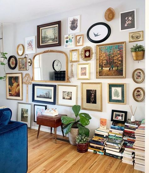 GISELE on Instagram: "Just finished cleaning these frames. Holy cow was dirty 🙈. And the books are getting out of control….But still loving my messy pile….One day I’ll figure out some kind of shelves…not ready for it yet 🤷🏻‍♀️😜" Mixed Picture Wall, Messy Picture Wall, Gallery Wall Ideas Corner, Mirror In Gallery Wall, Vintage Gallery Wall Prints, Eclectic Picture Frame Wall, Messy Gallery Wall, Mixed Wall Art, Eclectic Frames On Wall