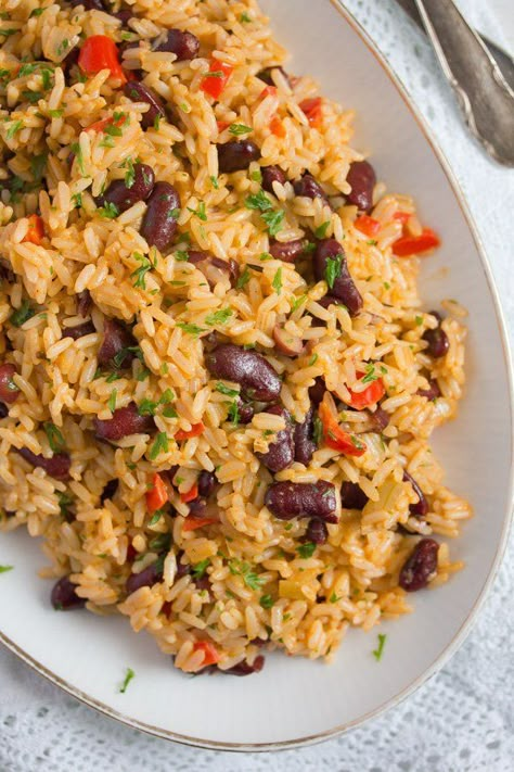 Easy Jamaican rice and peas or rice and beans recipe, quick to make a source of proteins. #whereismyspoon #riceandpeas #riceandbeans #jamaicanriceandpeas #jamaicanriceandbeans Jamaican Rice And Beans, Jamaican Rice And Peas Recipe, Easy Red Beans And Rice, Rice And Peas Recipe, Red Beans And Rice Recipe Easy, Jamaican Rice And Peas, Jamaican Rice, Red Beans N Rice Recipe, Rice And Beans Recipe