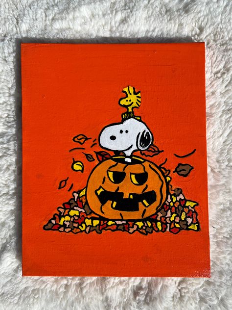 8x10 Handmade Acrylic Painting of Snoopy and Woodstock inside a jack-o-lantern on top of a pile of leaves. Covered with a clear gloss topcoat to protect it! Paintings For Halloween, Halloween Crafts Aesthetic, Jackolantern Paintings, Cute Autumn Drawings Easy, Cute Fall Painting Ideas, Spooky Art Ideas, Fall Paintings On Wood Easy, Snoopy And Woodstock Painting, Snoopy Halloween Painting