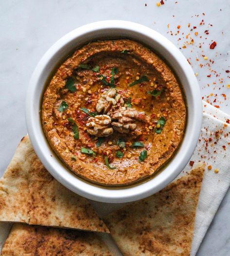 Muhammara is easily one of my favorite dips of all time. My first experience eating it was a few years ago during a research expedition to Jordan. A was interviewing a lovely Syrian lady that had j… Arabic Hummus Recipe, Smoked Eggplant Dip, Persian Eggplant Dip, Moroccan Eggplant Salad, Lebanese Hummus With Meat, Red Cabbage Salad, Indian Rice Recipes, Favorite Dips, Ham Recipes