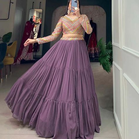 ₹1700  *🌷Lehenga choli🌷*  This wedding season you definitely would have worn one of your favourite outfit and giving major fairytale vibes🪻.  *Lehenga(Stitched)* Lehenga Fabric : Georgette Lehenga Work : Plain  Lehenga Waist : SUPPORTED UP TO 42 Lehenga Stitching : Drawstring Length : 41 Flair : 9 Meter  Inner : Micro Cotton  *Blouse(Stitched)* Blouse fabric : Pure Viscose Jacquard Silk  Blouse Work : Weaving Work With Position print  Blouse Size : *40* (Inside 2 inch extra margin availab... Lavender Lehenga, Plain Lehenga, Georgette Lehenga, Stitched Lehenga, Lehenga Designs Simple, Choli Designs, Indian Dresses Traditional, Fancy Dresses Long, Indian Lehenga