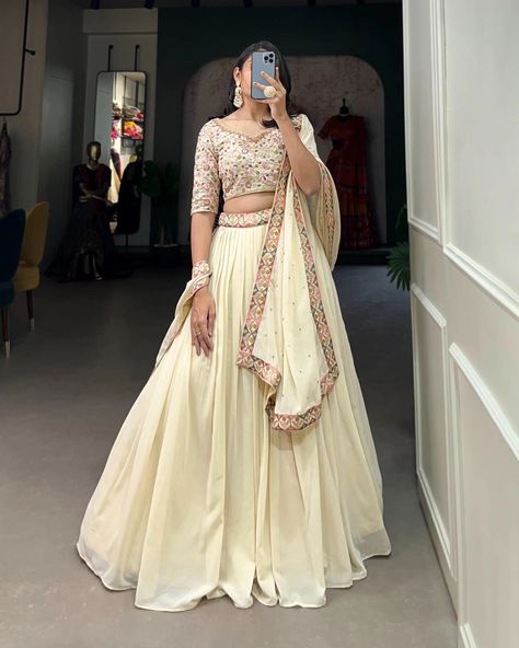 Price : 1800 #apex__outfit Capture Hearts in Off-White: Exquisitely Embroidered Lehenga Choli with Shimmering Sequins 🪷 Lehenga(Stitched) : Lehenga Fabric : Georgette Lehenga work : Sequins and Thread Embroidery Work With Lace Border Lehenga Waist : SUPPORTED UP TO 42 Lehenga Closer : Drawstring with Zip Stitching : Stitched With Canvas and Can Can Length : 41 Flair : 5 Meter Inner : Silk Blouse(Unstitched) : Blouse Fabric : Georgette Blouse Work : Sequins and Thread Embroidery Work B... Zip Stitching, Lehenga Stitched, White Lehenga Choli, Sequins Lehenga, Haldi Outfit, White Lehenga, Mens Smart Casual Outfits, Georgette Lehenga, Lehenga Fabric