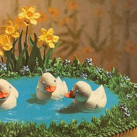 Jess on Instagram: "Ducklings Afloat on a Pond Cake (The Wilton Way of Cake Decorating, 1979) #vintagecookbooks#vintagefood#retrofood#weirdfood#vintagefoodstyling#oldcookbooks#cakedecorating#duckcake#ducklingcake#springcake#pondcake#vintagecake#retrocake#animalcake#1970s#1970sfood#1970scooking#1970scookbook#70scake#1970scake" Pond Cake Decoration, Pond Cake, Vintage Animation, Box Cakes, Wilton Cakes, A Pond, Vintage Cookbooks, Bento Box Lunch, Vintage Cake