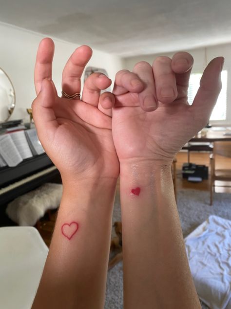 Tattoos To Do With Your Mom, Matching Tats For Mom And Daughter, Matching Tats Mom And Daughter, Mom And Daughter Heart Tattoos, Tatoos Mother And Daughter, Aesthetic Mother Daughter Tattoos, Mom And Daughter Tattoos Unique Black Women, Matching Heart Tattoos Mother Daughters, Tiny Matching Tattoos Mother Daughter