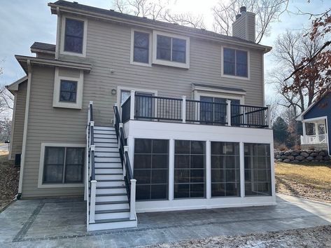 3 Season Porch Under Deck, Deck Over Sunroom, Walkout Basement Sunroom, Sunroom Under Deck Ideas, Screen In Under Deck, Room Under Deck Ideas, Addition With Deck On Top, Sunroom Under The Deck, Under Deck Room Addition