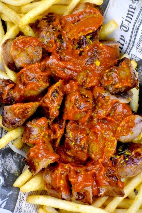 Closeup overhead shot of our currywurst recipe. Food In Germany, Currywurst Recipe, German Meals, Curry Wurst, Flank Steak Fajitas, Curry Ketchup, Bratwurst Sausage, Ketchup Sauce, Ground Beef And Potatoes