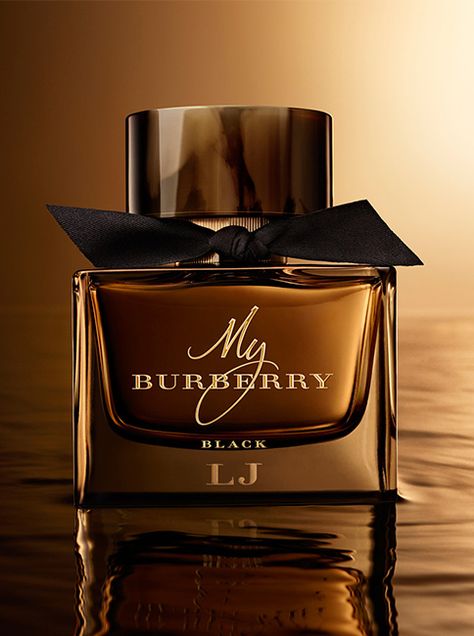 My Burberry Black, the sensual new fragrance for women. The bottle is topped with a horn-finish cap and tied with a black gabardine knot inspired by the black trench coat. My Burberry Black, Burberry Perfume, Black Perfume, Hermes Perfume, Black Trench Coat, Miniature Bottles, Celebrity Perfume, Burberry Black, Perfume Design