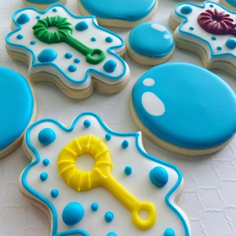 Katie Carter on Instagram: “Happy 1st birthday, Memphis! This bubble theme was so much fun. Some designs and design inspiration from @laurascookiestudio.…” Bubble Cookies Decorated, Bubbles And Brews Cookies, Bubble Decorated Cookies, Bucees Birthday Cookies, Bubble Cookies, Octopus Sugar Cookies Decorated, Bubble Guppies Cookies, Happy 1st Birthday, Sugar Cookie Frosting