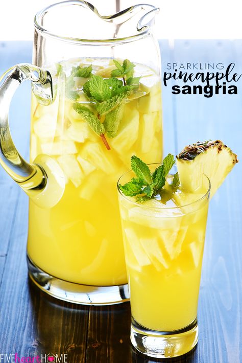 Sparkling Pineapple Sangria Recipe ~ a bubbly, refreshing, tropical summer cocktail made with just five ingredients, perfect for poolside, parties, and BBQs! | FiveHeartHome.com #pineapple #sangria #whitesangria #prosecco #summer #cocktails #drinkrecipes #recipe #fivehearthome Pineapple Sangria Recipes, Pineapple Sangria, Sangria Drink, Sparkling Sangria, Red Sangria Recipes, Spicy Candy, Summer Punch, Cocktail Fruit, Best Summer Cocktails