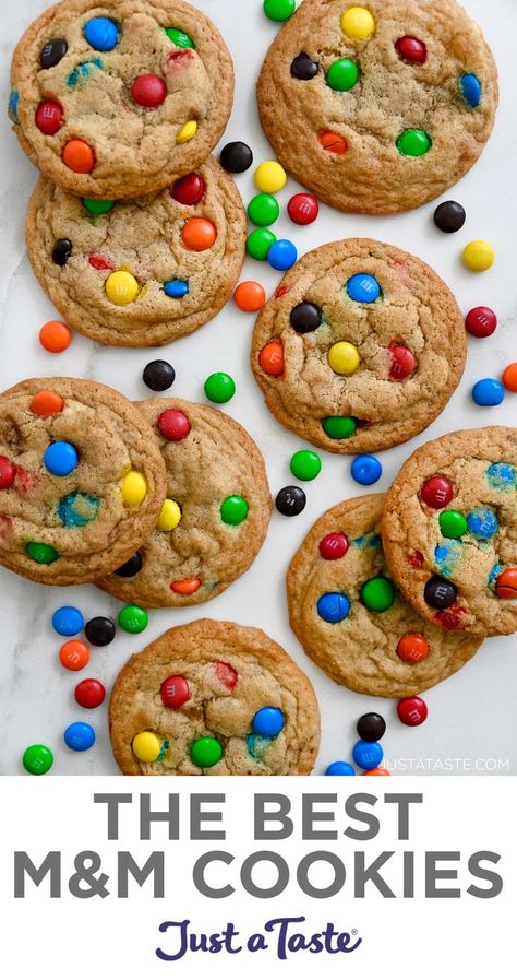 A top-down view of M&M cookies studded with a rainbow of M&M's. M&m Cookies Soft, Mint M And M Cookies, Soft Batch M&m Cookies, Recipe For M&m Cookies, M M Mini Cookies Recipe, Subway M&m Cookie Recipe, Homemade M&m Cookie Recipe, Cookies Recipes M&m, Chocolate Chip Cookies M&m