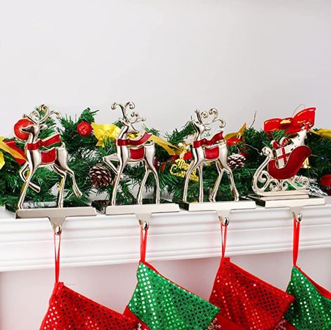 3 silver reindeer and a sled stocking holders Stocking Hooks Mantle, Stocking Holders For Mantle, Stocking Hangers, Stocking Hooks, Hanging Christmas Stockings, Christmas Stocking Hangers, Reindeer And Sleigh, Stocking Holder, Christmas Stocking Holders