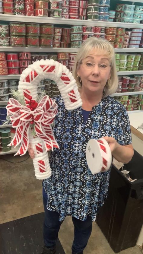 Let’s Craft! Easy Dollar Tree Candy Cane Bow! So cute! | By Craftymacs LLC Candy Cane Wire Form Ideas, Candy Cane Diy Crafts, Diy Candy Cane Wreath Tutorials, Metal Candy Cane Wreath Diy, Candy Cane Reindeer Wreath, Chunky Yarn Candy Cane Wreath, Dollar Store Candy Cane Wreath, Candy Cane Decorations Diy Dollar Stores, Dollar Tree Candy Cane Wreath