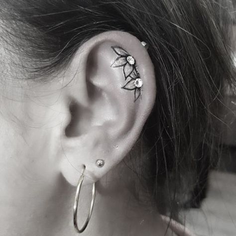 Ear Tattoo With Piercing Flowers, Small Tattoo By Ear, Ear Flower Tattoo With Piercing, Ear Piercing And Tattoo, Flower Ear Tattoo With Piercing, Flower In Ear Tattoo, Ear Tattoo Inner With Piercing, Inner Ear Tattoo With Piercing, Tattoos In Front Of Ear