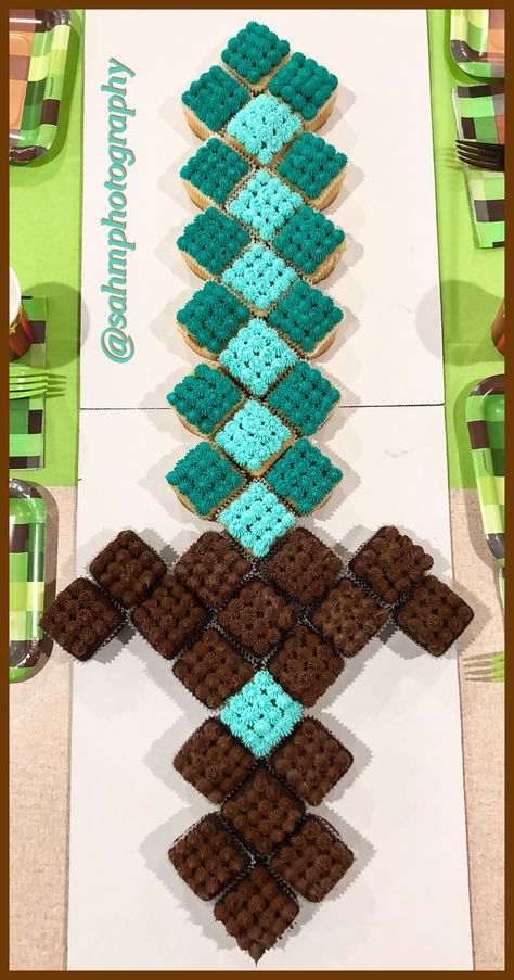 Custom Minecraft Cupcake Sword! Minecraft Birthday Dessert, Mind Craft Cake Ideas, Mind Craft Birthday Party Cake, Easy Diy Minecraft Birthday Cake, Minecraft Cupcake Pullapart, Mind Craft Cupcakes Ideas, Minecraft Outdoor Party Ideas, Dollar Tree Minecraft Ideas, Minecraft Party Decorations Birthdays