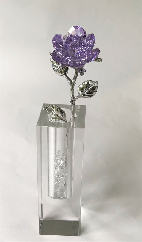 This gorgeous sparkling purple crystal Rose is handcrafted by Bjcrystalgifts using Swarovski crystals. The rose, which stands approximately 5 1/2 inches tall, sits in a crystal vase. The rosebud, which is handcrafted with Swarovski crystals, is approximately 1 1/2 inches in diameter and the stem of the rose is silver tone in color. The vase is approximately 5 1/4 inches tall and is approximately 1 1/2 inches square. The rose comes with a few Swarovski crystals to be placed in the cavity of the v Owl Food, Sweet 15 Party Ideas Quinceanera, Swarovski Crystal Figurines, Flower Centerpiece, New Rochelle, Baccarat Crystal, Purple Girls, Crystal Figurines, Unique Flower