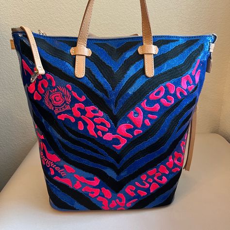 This Consuela Tote Bag Features A Bold Combination Of Electric Blue, Black, And Hot Pink With A Striking Chevron Pattern And Eye-Catching Pink Embellishments. Pink Embellishments, Consuela Bags, Black And Hot Pink, Chevron Pattern, Womens Tote Bags, Electric Blue, Blue Black, Embellishments, Hot Pink