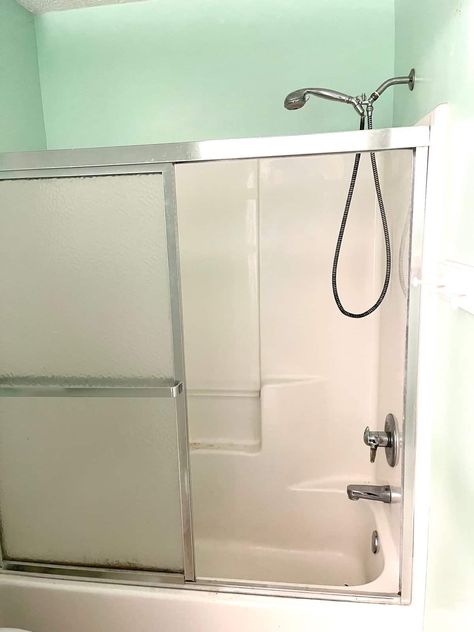 Replacing a Dated Glass Shower Door with a Double Rod and Curtains - Pure Happy Home How To Remove Shower Doors, Glass Shower Door With Curtain, Replace Shower Door With Curtain, Shower Curtain Over Glass Door, Shower Curtain Over Glass Door Ideas, Sliding Shower Door Makeover, Replace Shower Door, One Piece Tub Shower, Grid Shower Door