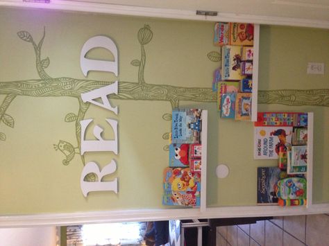 Ikea picture ledge shelving used for a child's reading nook, complimented by a hand painted wall mural. Hand Painted Wall Mural, Painted Wall Mural, Ikea Picture Ledge, Picture Ledge, Wall Murals Painted, School Room, Book Shelves, Hand Painted Walls, Painted Wall