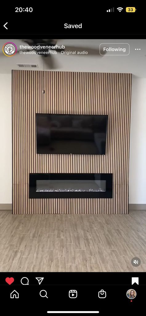 Slat Wall Electric Fireplace, Slatted Wall Fireplace, Media Wall Wood Slats, Black Slat Tv Wall, Black Slat Wall Tv, Pole Wrap Fireplace, Slat Fireplace Wall, Wood Slat Fireplace, Reeded Fireplace