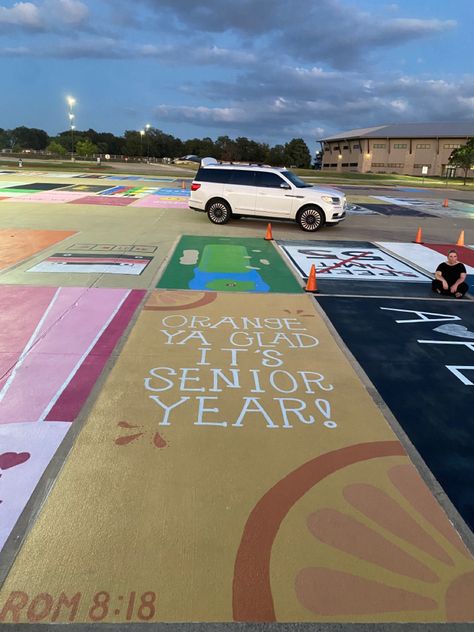 orange parking spot "orange ya glad it's senior year" romans 8:18 on bottom Group Parking Spot Ideas, Orange Senior Parking Spot, Highschool Parking Spot Ideas Funny, Senior Parking Spot Album Cover, Marvel Senior Parking Spot, Funny Painted Parking Spots, Disney Parking Spot Painting Ideas, Disney Senior Parking Spaces, Friends Parking Spot Painting