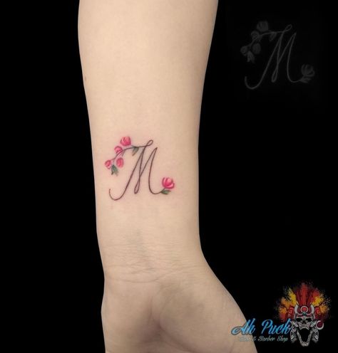 M Tattoo With Flowers, Cute Meaningful Tattoos, Hand Tattoo Images, Wrist Band Tattoo, Animal Tattoos For Women, Toe Tattoos, Ear Tattoo Ideas, M Tattoos, Ear Tattoos