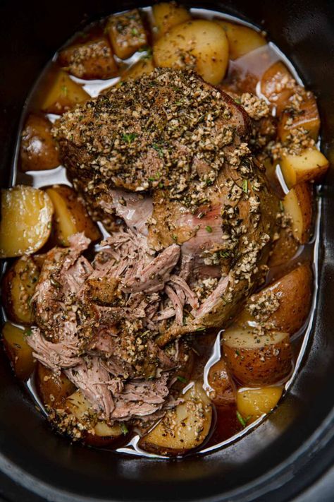 Slow Cooker Leg of Lamb is an easy lamb recipe perfect for Easter dinner! Juicy, tender boneless leg of lamb with seasoned with garlic, rosemary, and lemon. #dinner #slowcooker #crockpot #lamb #legoflamb #weeknightdinner #holidaydinner #dinnerthendessert Lamb Chop Crockpot, Leg Of Lamb Crockpot Recipes, Lamb Chops In Crockpot, Lamb Chop Recipes Crockpot, Lamb Shoulder Slow Cooker, Lamb Leg Slow Cooker, Slow Cooker Leg Of Lamb Recipe, Lamb Recipes Crockpot, Lamb Slow Cooker Recipes