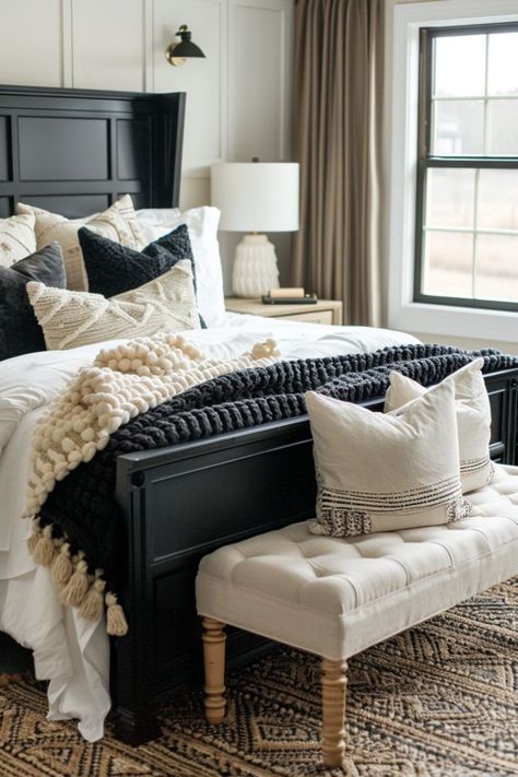 Discover 50+ stunning black & neutral bedroom ideas to transform your space into a peaceful retreat. Find inspiration and tips here! Modern Farmhouse Bedroom Dark Furniture, Modern Farmhouse Bedroom Black Furniture, Black Farmhouse Bed, Black Frame Bed Bedroom Ideas, Black Brown And White Bedroom, Black And White Bedroom Ideas Cozy, Black Bed Frame Decor, Black Neutral Bedroom, Joanna Gaines Bedroom Ideas