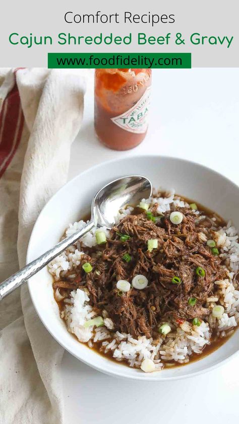 Traditional cajun rice and gravy dish with shredded beef so hearty and comforting that you will look for excuses to make any chance you get. #cajunrecipes #riceandgravy #shreddedbeef #comfortfood #dinner #foodfidelity #slowcook Cajun Gravy, Savory Lunch, Cajun Rice, Creole Food, Rice And Gravy, Cajun Dishes, Cajun Creole Recipes, Slow Cooked Beef, Creole Recipes