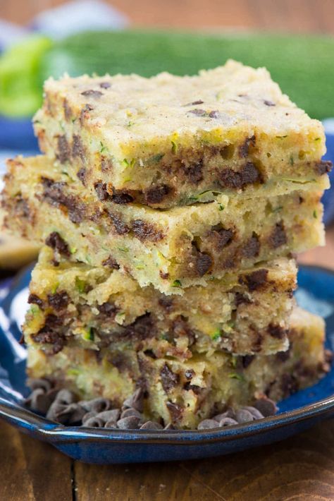 Chocolate Chip Zucchini Bars - easy one bowl zucchini recipe isn't quite a cookie or a cake; it's a delicious sweet dessert full of zucchini and chocolate! Zucchini Dinners, Side Dishes Zucchini, Zucchini Desserts, Zucchini Bars, Zucchini Breakfast, Zucchini Side Dishes, Recipe Zucchini, Easy Zucchini Recipes, Crazy For Crust