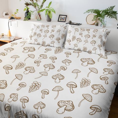 "Our collection of Mushroom Bedding, Mushroom Blanket, Mushroom Decor, Cottagecore Bedding, Mushroom Lovers Gift, and Botanical Bedding is the perfect way to bring a touch of nature and a whimsical, cottage-style look to your bedroom. Our Mushroom Duvet Cover Sets feature a vibrant design of brown mushrooms on a white background, creating a cozy and inviting atmosphere that is perfect for any nature-inspired home. The bold, vivid colors in this set will add a cheerful and cheerful pop of color t Mushroom Bedsheet, Mushroom Bed Sheets, Mushroom Themed Bedroom Ideas, Mushroom Bedspread, Mushroom Themed Bedroom, Mushroom Bedroom Aesthetic, Mushroom Bedroom Ideas, Mushroom Aesthetic Room, Mushroom Comforter