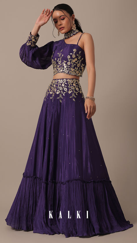 Put forth a fun and fabulous look by stepping out in this exquisitely designed lehenga set. Featuring a single cold-shoulder neckline, it flaunts intricate embroidery. Decked with sequin, cutdana and gota patti work, this two-piece outfit comes crafted on flowy chiffon fabric. Choli Design, Purple Lehenga, Gota Patti Work, Choli Designs, Dress Indian, Dresses Indian, Designer Party Wear Dresses, Dress Indian Style, Fancy Dress Design