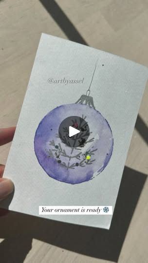 6.2K views · 586 reactions | DIY Watercolor Ornament: Quick Steps

 1. Apply watercolor to a circular object and stamp it on paper.
 2. Paint inside with festive watercolor shades.
 3. Draw snowflakes or a tree with a silver marker.
 4. Add shimmer or glitter.

Your ornament is ready!
•
•
•
•
•
•
•
•
•
•
•
•
•
•
#DIYOrnament #WatercolorCrafts #HolidayDecor #ChristmasOrnament #HandmadeDecor #FestiveCrafts #WatercolorArt #CreativeDIY #ShimmerArt #EasyCrafts | Assel Jaffee Watercolor Shades, Snowflakes Drawing, Festive Crafts, Diy Watercolor, Color Crafts, Christmas Watercolor, Watercolor Cards, Crafty Stuff, Ornaments Diy