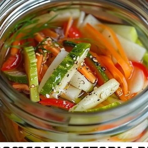 Chef zouheir on Instagram: "Just whipped up a batch of these vibrant Vietnamese Vegetable Pickle Medley. Perfect for adding a zesty crunch to any meal! 🥕🌶️🥒  Ingredients:  2 medium carrots, peeled and julienned 1 large daikon radish, peeled and julienned 1 cucumber, thinly sliced 1 red bell pepper, thinly sliced 2 cups water 1 cup white vinegar 1/2 cup sugar 2 tablespoons salt 3 cloves of garlic, minced 1 small chili, thinly sliced (optional for heat) Fresh dill and mint leaves for garnish Directions: In a bowl, combine the julienned carrots, daikon radish, cucumber, and red bell pepper. In a saucepan, bring the water, vinegar, sugar, and salt to a boil. Stir until the sugar and salt dissolve completely. Pour the hot vinegar mixture over the vegetables, ensuring they are completely subm Vietnamese Pickled Vegetables, Hot Vinegar, Vegetable Pickle, Radish Cucumber, Pickled Vegetables Recipe, Daikon Radish, Julienned Carrots, Chinese Vegetables, Eat Veggies