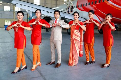 Air India To Start Weighing Cabin Crew To Boost Image Cabin Crew Uniform, Air India Express, Eaton Centre, Bald Look, Uniform Ideas, Aviation Posters, Staff Uniforms, Manifestation Techniques, Blanket Design