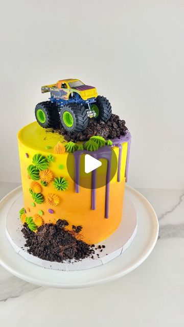 Jessi Kaasa on Instagram: "MONSTER 👊 TRUCK 👊 CAKE 👊 I was so excited when I got this request. I love the fun colors and Oreo dirt. It makes my boy mom heart so happy 💜🧡💚💛 #kaaked #kaakedbykaasa #cake #cupcakes #birthdaycake #dripcake #monstertruckcake #boycake #cakesofinstagram #cakestagram #cakedecoratingvideos #cakereels #cakecakecake #Charleston #SC #homebaker #shoplocal #supportsmallbusiness" Monster Truck Birthday Cake Ideas, Hot Wheels Monster Truck Cake, Birthday Cake For 5 Year Boy, Boys 4th Birthday Cake, Toddler Cake Ideas, Car Cakes For Boys Birthday For Kids, Toddler Boy Birthday Cake, Monster Jam Cakes For Boys, Monster Truck Sheet Cake