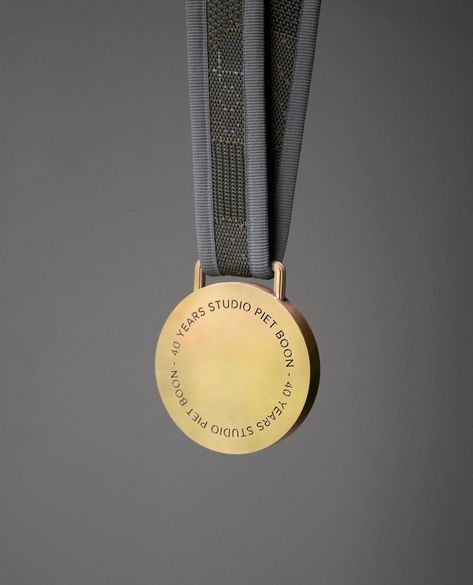 Honoring 40 years of design.⁠ ⁠ The collaboration between Studio Piet Boon and artist Frankey continues with the ‘TIME RIBBON’ medal - a… | Instagram Medals Design, Rings Stand, Symbol Of Growth, Medal Design, Award Design, Charity Run, Running Medals, Medal Ribbon, Sports Medals