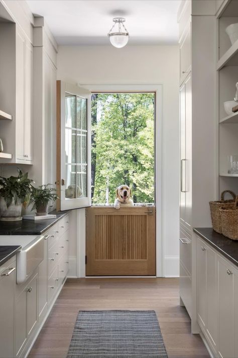 Beautiful separated pantry with swinging dutch doors for access to back patio. Photo: Jenn Verrier • • #customdesign #butlerspantry #dutchdoors #dog #design #whitewash #lightwood #whiteoakfloors #cabinetry #apronfrontsink #roomdecor #roomdesign #kitchendesign Scullery Pantry, Copper Metal Roof, Tudor Architecture, Interiors Kitchen, Built In Pantry, Revere Pewter, Tudor Style Homes, Herringbone Floor, Dutch Door