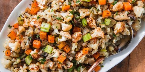 Cauliflower Stuffing — Delish.com Cauliflower Stuffing, Thanksgiving Diner, Gluten Free Thanksgiving Recipes, Gluten Free Thanksgiving, Thanksgiving 2020, Recipes Thanksgiving, Healthy Thanksgiving, Dressing Recipes, Free Thanksgiving