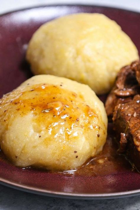 Fufu is a staple food in many countries in West Africa, Central Africa, and the Caribbean. Traditionally it can be made with starchy food like cassava, yams or plantains. This easy fufu recipe boils cassava and plantains first, and then blend them into a dough-like consistency. Finally, it’s shaped into small balls and served with soup, stew, or sauce. So satisfying and delicious! #African #sides #Vegetables Fou Fou Recipe, Fu Fu Recipe African, Easy Fufu Recipe, Fufu Recipe Africans, Mali Food, African Fufu, Fufu Recipe, Afrikaans Recipes, Cassava Recipes