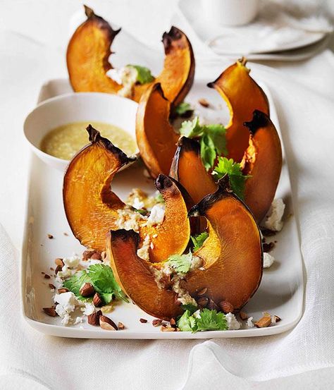 Australian Gourmet Traveller recipe for roast pumpkin wedges with almonds, goat’s cheese and tahini dressing. Vegetarian Christmas Recipes, Tahini Dressing Recipe, Vegetarian Christmas, Pumpkin Soup Recipe, Baked Veggies, Tahini Dressing, Roast Pumpkin, Vegan Pumpkin, How To Eat Paleo