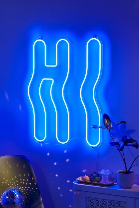 Greet guests on the way in with this wavey neon light for your space. LED neon sign features a 'Hi' slogan and groovy lettering. Mounted onto an acrylic back for effortlessly attaching to your wall. Plugs into mains to power on. Star Pendant Lighting, Neon Sign Shop, Novelty Lighting, Neon Light Signs, Arc Floor Lamps, Party Lights, Room Setup, Custom Neon Signs, Led Signs