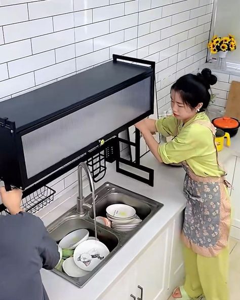 Smart gadgets and space savers you can't live without! | Smart gadgets and space savers you can't live without! | By Nifty & Thrifty | Life just got a whole lot easier with these genius gadgets that save the day. This sink rack multitasks like a pro, draining water and storing your essentials. Who wants moist buggy rice? Not you. This rice bucket is on a mission to keep your grains fresh and insect free. You need more space without the hassle? Check out this floor standing storage rack. It's des Sink Shelf Kitchen, Large Kitchen Sinks, Kitchen Sink Rack, Sink Dish Drying Rack, Kitchen Design Black, Kitchen Storage Space, Kitchen Sink Storage, Modern Kitchen Design White, Sink Shelf