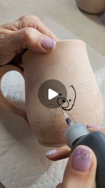 Amy Ruvolo on Instagram: "Painting Easter cuteness 💜 #handpaintedpottery #handmademug #mug #eastermug #bunnymug #pottery #ceramics ##coffeemugs #seasonedpottery" Easter Ceramic Decorations, Cookie Jar Pottery Painting Ideas, Paint Pottery Mug, Mug Ceramic Painting, Instagram Painting, Ceramic Bunny, Hand Painted Mugs, Hand Painted Pottery, Painted Mugs