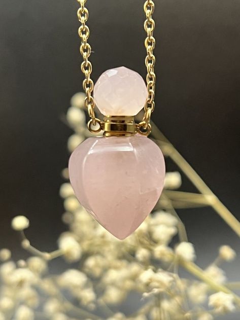 Pink Rose Quartz Crystal Bottle Necklace. Bottle holds 1ml of liquid. Comes with 2 pipettes for your perfume, essential oil or potion. Bottle Pendant comes on a 16" or 18" inch Necklace. A choice of Gold Plated or 14k Gold Filled. Crystal Bottle Necklace, Perfume Bottle Necklace, Potion Bottle Necklace, Potion Necklace, Perfume Necklace, Magic Jewelry, Crystal Bottle, Perfume Container, Crystal Drawing