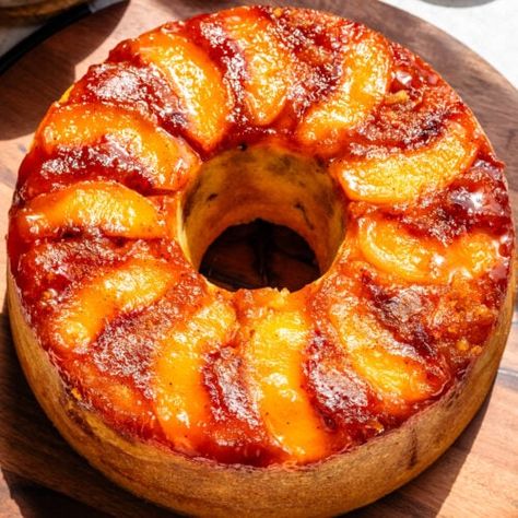 peach cobbler bundt cake with peaches and caramel on top. Peach Cobbler Pound Cake Recipe, Peach Cobbler Pound Cake, Pies And Tacos, Peach Cobbler Cake, Caramelized Peaches, Peach Pound Cakes, Peach Recipes, Pound Cake Recipe, Vegan Pie