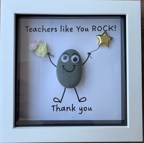 A beautiful 'Thank you Teacher' themed pebble art designed picture. Designed as an end of term / year gift for your favourite teacher. This picture is handmade and is displayed in a versatile glass front white box frame which can be wall hung or free standing. Pebble art frame size is 6 inches by 6 inches Text reads :  'Teachers like you ROCK! Thank you' Painting For Teachers Gift, Gifts For Professors, Homemade Teacher Gifts, Handmade Teacher Gifts, Art Teacher Gifts, Painted Rock Animals, Pebble Pictures, Painted Rocks Kids, Stone Pictures