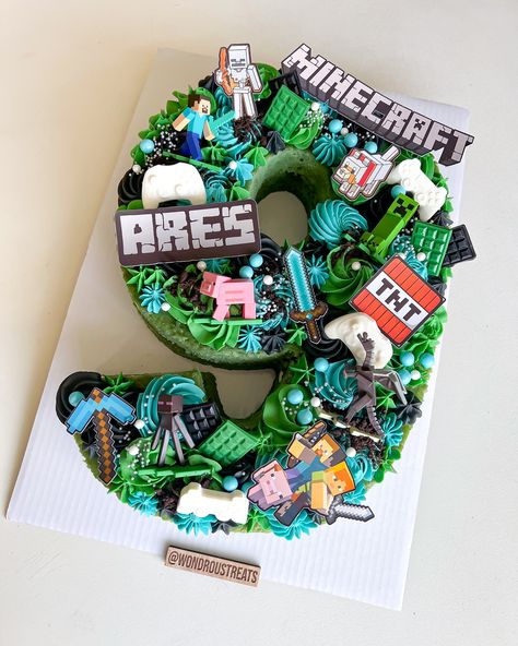 Check out this Minecraft number cake we made for Ares’ 9th birthday! 🎮✨ Perfect for a little gamer’s big day. #minecraft#minecraftbirthday#minecraftcake#cake#lasvegascakes#minecraftnumbercake#numbercake#lasvegas#cake Gamer Cookie Cake, Gamer Bday Cake, Gamer Cakes For Boys, Lego Minecraft Cake, Minecraft Number Cake, Gamer Cake Ideas Boys, 9th Birthday Boy Ideas, Birthday Cake Minecraft, Nemo Cake