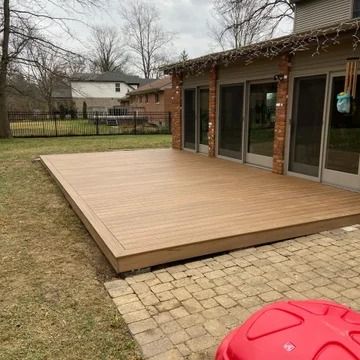 75 Ground Level Deck Ideas You'll Love - February, 2024 | Houzz Ground Level Decks Backyard, Ground Level Deck Ideas On A Budget, Ground Level Deck Ideas, Covered Deck Designs, Composite Decks, Ground Level Deck, Bedroom Deck, Aluminum Handrail, Lakehouse Ideas