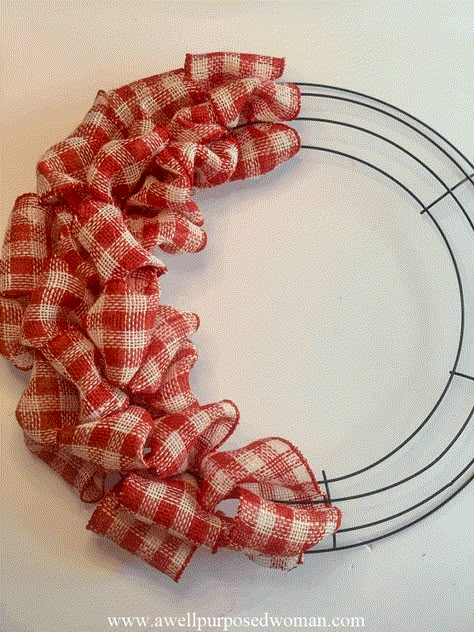 Learn how to make a ribbon wreath with this step by step tutorial. Anyone can learn how to make a ribbon wreath in just a few minutes. Add a beautiful ribbon wreath to your front door or an old window inside your home. #howtomakearibbonwreath #ribbonwreath #diywreath #farmhousewreath #diyfourthofjulywreath #burlapwreath #diyburlapwreath #valentinesdaywreath Make A Ribbon Wreath, Ribbon Wreath Tutorial, Christmas Wreaths For Windows, Burlap Ribbon Wreaths, Ribbon Wreath Diy, Burlap Wreath Tutorial, Mesh Ribbon Wreaths, Mesh Wreaths Diy, Deco Mesh Wreaths Tutorials